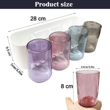 Space saving toothbrush wall holder